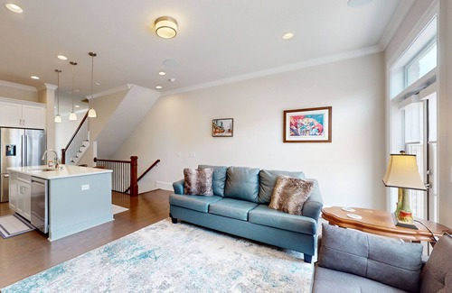 Hitch Village - Fred Wessels Homes Casa | Dog-friendly townhouse with modern kitchen, balcony, garden tub, & central AC