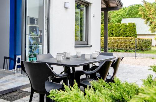 Dziwnowek Casa | Dom OSTOYA Wrzosowo - Ogród, Plac Zabaw & Klimatyzacja by Noclegi Renters