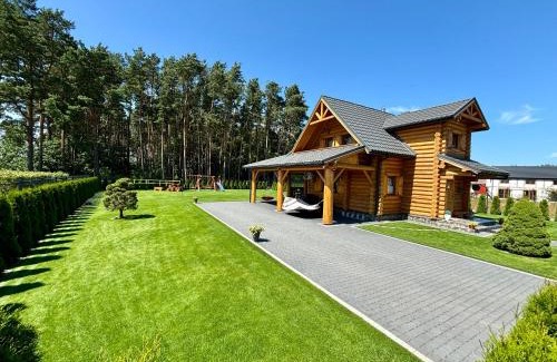 Karwienskie Bloto Drugie Casa | Dom Wakacyjny Złoto Północy na wyłączność, parking, plac zabaw, tarasy
