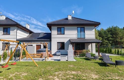 Szeligi Apartamento | Dom wakacyjny Bliźniacza Natura nad rzeką, Makosieje