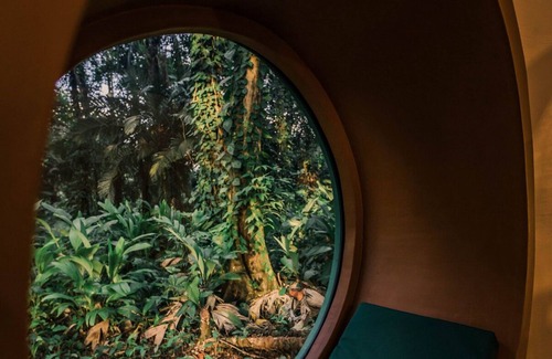 Big Creek Casa | Dome shaped bungalow in a lush tropical forest, steps away from ocean views.