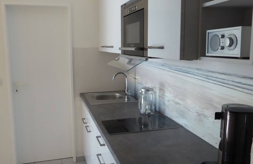 Wangerooge Apartamento | "Domicilio en el faro", terraza sur m. Silla de playa central