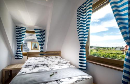 Nowecin Casa | Domki Łeba, Apartamenty Łeba - Polanki23 - basen, sauna, kino