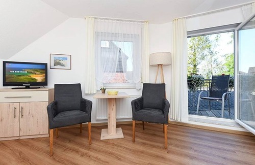 Neuharlingersiel Cabaña | Doppelzimmer mit Balkon Oder Terrasse - Doppelzimmer in der Hotel-pension Marlies