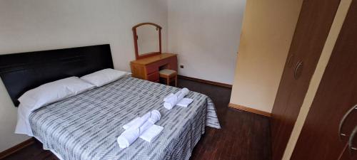 La Perla Casa | Dormitorio con baño compartido a 25 minutos del Apto