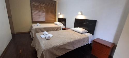 La Perla Casa | Dormitorio con baño compartido a 25 minutos del Apto