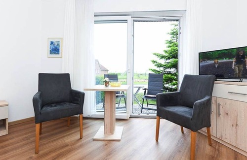 Neuharlingersiel Cabaña | Double room with balcony or terrace - Double room in the Hotel-Pension
