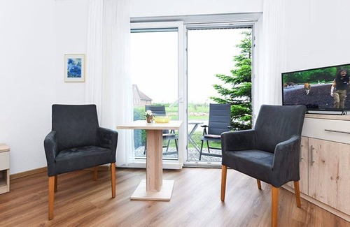 Neuharlingersiel Cabaña | Double room with balcony or terrace - Double room in the Hotel-Pension