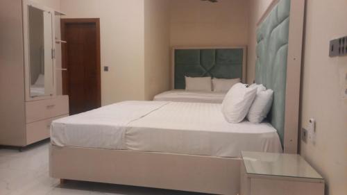 Garden Town Hotel | Dove INN Express