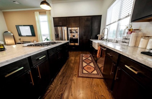 Northside Casa | Downtown Escape with Backyard, Gameroom and Hot Tub