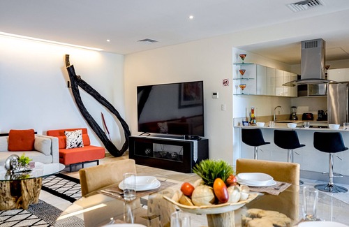 Gonzalo Guerrero Apartamento | Dream getaway near the beach and city with pool, balcony, gym, fast WiFi & W/D