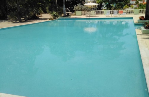 Orange Bay Condominio | ¡"SUEÑOS HECHOS REALIDAD" es el condominio en Little Bay que está buscando disfrutar!