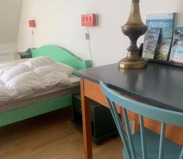 Nordfyns Apartamento | Drejerindens kreative stemningsfulde lejlighed