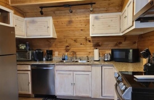 Huddleston Villa | Driveway to Huge covered dock, Wifi, Firepit, Screened In porch