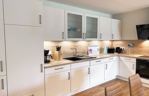 Tossens Apartamento | Dune magic - relaxed enjoyment. Sauna. Low barrier width. Comfort.