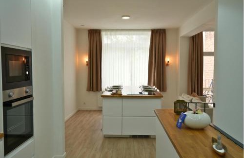 Sint-Agatha-Berchem Apartamento | Duplex familiale 3 chambres, 3 salles de bains & jardin à Bruxelles by CYGO Gestion