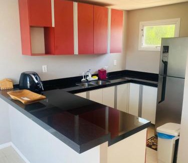 Canoa Quebrada Apartamento | Duplex vista mar acomoda até 12 pessoas com piscina e estacionamento privativo