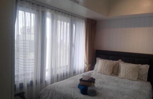 San Antonio Apartamento | E & T Homecations 2 Bedroom Apartment at SMDC Air Residences