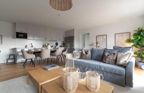 Bastad Casa | Earthy Ground Floor Home with Patio Sunbeds Greenery