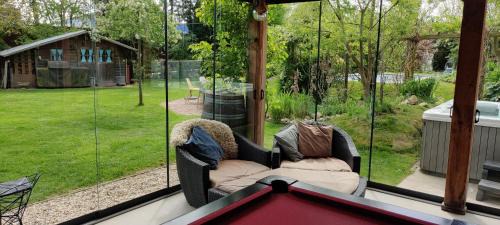 Tilburg Casa | Ecolodge Tilburg met zwembad in groene oase bij centrum