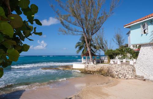 Tower Isle Hotel | Edgewater Beach Villa - Beach Front, Close to All Attractions