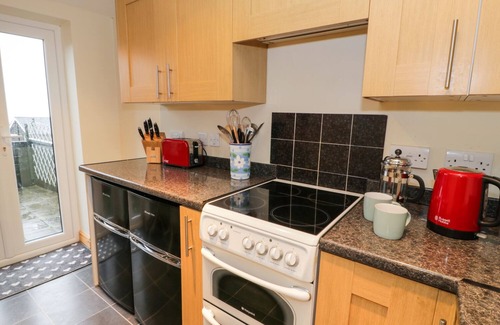 Harlech Cabaña | EDRYDD, admite mascotas, con chimenea en Harlech, Ref 998610