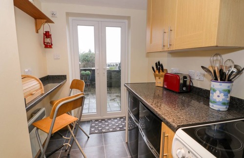 Harlech Cabaña | EDRYDD, admite mascotas, con chimenea en Harlech, Ref 998610