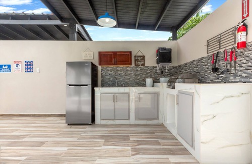 Mameyes II Villa | El Yunque Paradise | Private pool, beach tennis court, fire pit, outdoor shower,