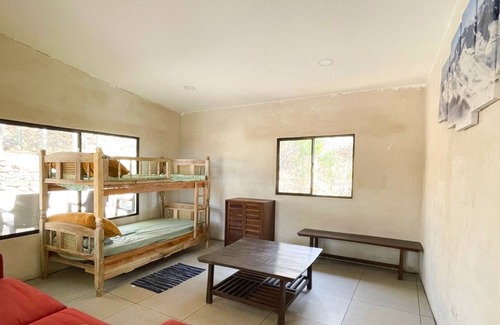 Chiltiupan Casa | El Zonte mountain home with stunning ocean views 5 minutes walk to beach