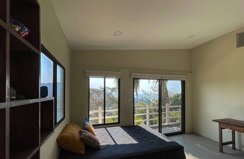Chiltiupan Casa | El Zonte mountain home with stunning ocean views 5 minutes walk to beach