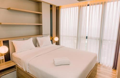 Pinang Apartamento | Elegant and Comfort 1BR at The Smith Alam Sutera Apartment By Travelio