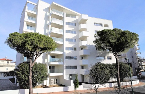 Lignano Sabbiadoro Apartamento | Apartamento elegante y moderno cerca del centro de la ciudad de Lignano