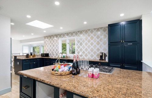 Monroe Casa | Elegant and spacious home with sauna and heated pool