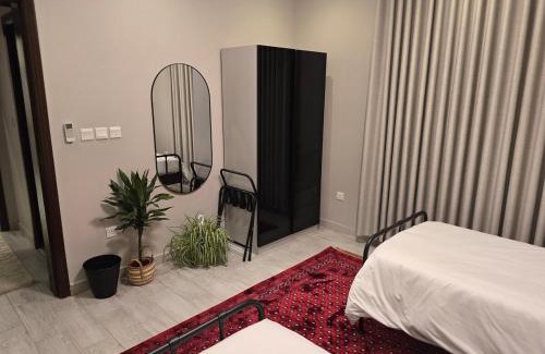 Al-Hamra'a Apartamento | Elegant & Comfortable Stay Near the Airport