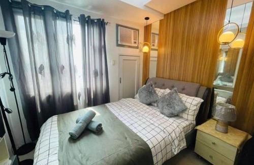 Santo Cristo Apartamento | Elegant Condotel at Grass Residence