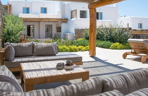 Tourlos Villa | Elegant Mykonos Villa | Villa Rowena | 4 Bedrooms | Breathtaking Sea Views | Spacious Furnished Sun Terrace | Private Outdoor Hot Tub | BBQ Facilities | Shaded Outdoor Dining Area | Agia Sofia, Tourlos