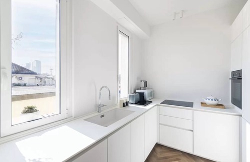 Central Station Apartamento | Elegant Penthouse with Perimeter Terrace and Panoramic Views in Milan