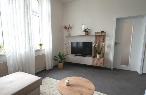 Hlubocepy Apartamento | Elegant Riverside Apartment with Breathtaking Rock Views