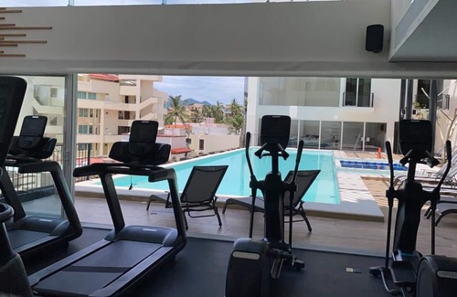 Bucerias Apartamento | Elegante Estudio, a una cuadra de la playa, Picina, Gym.