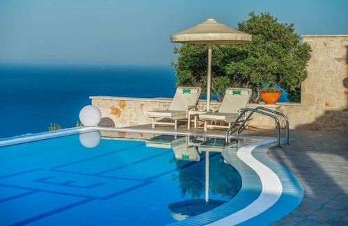 Varvara Villa | Elegant Zakynthos Villa | Villa Kingsley | 4 Bedrooms | Breathtaking Sea Views | Spacious Furnished Sun Terrace | Private Outdoor Pool with Hydro Massage Spot | Shaded Outdoor Dining Area | Agios Nikolaos