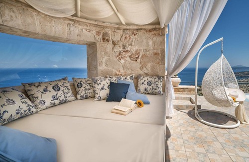 Varvara Villa | Elegant Zakynthos Villa | Villa Kingsley | 4 Bedrooms | Breathtaking Sea Views | Spacious Furnished Sun Terrace | Private Outdoor Pool with Hydro Massage Spot | Shaded Outdoor Dining Area | Agios Nikolaos