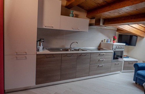 Rotonda Apartamento | Elegante e Moderno Bilocale in Mansarda