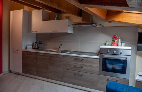 Rotonda Apartamento | Elegante e Moderno Bilocale in Mansarda