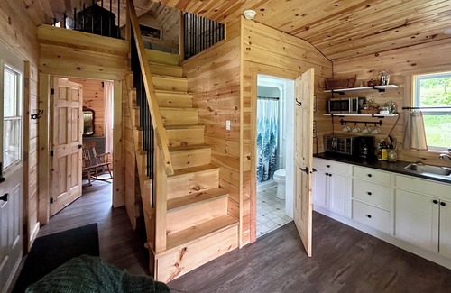 Canterbury Cabina | Elevated cabin nestled among the trees, and the Saint John River. Pet friendly.