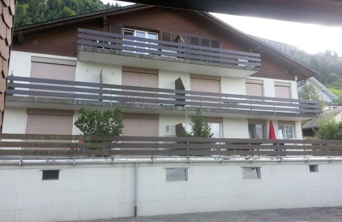 Emmetten Apartamento | Apartamento con una gran terraza y vistas al lago y a las montañas.
