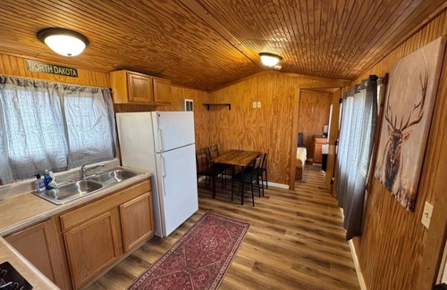 Belfield Cabina | Elkhorn Cabin Summary
