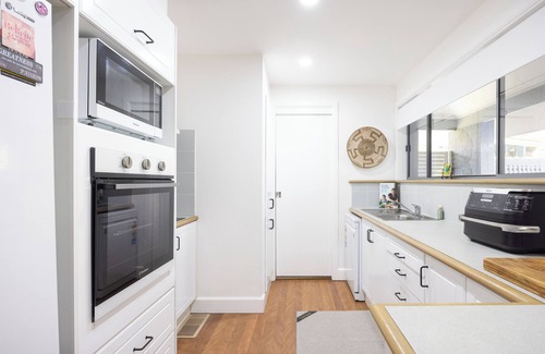 Cams Wharf Villa | Elysian Escape - 4 Pools, Lakeside, Resort Amenities