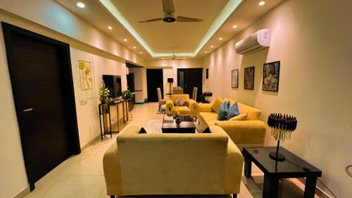 Blue Area Hotel | ELYSIUM TOWER Modern & Luxury Apartments Overlooking Centaurus Mall Islamabad
