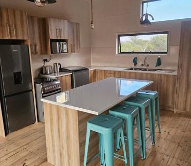 Leeupoort Casa | Emintha Log House