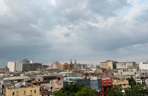 Downtown Guadalajara Apartamento | En el centro de Guadalajara con vista a la ciudad